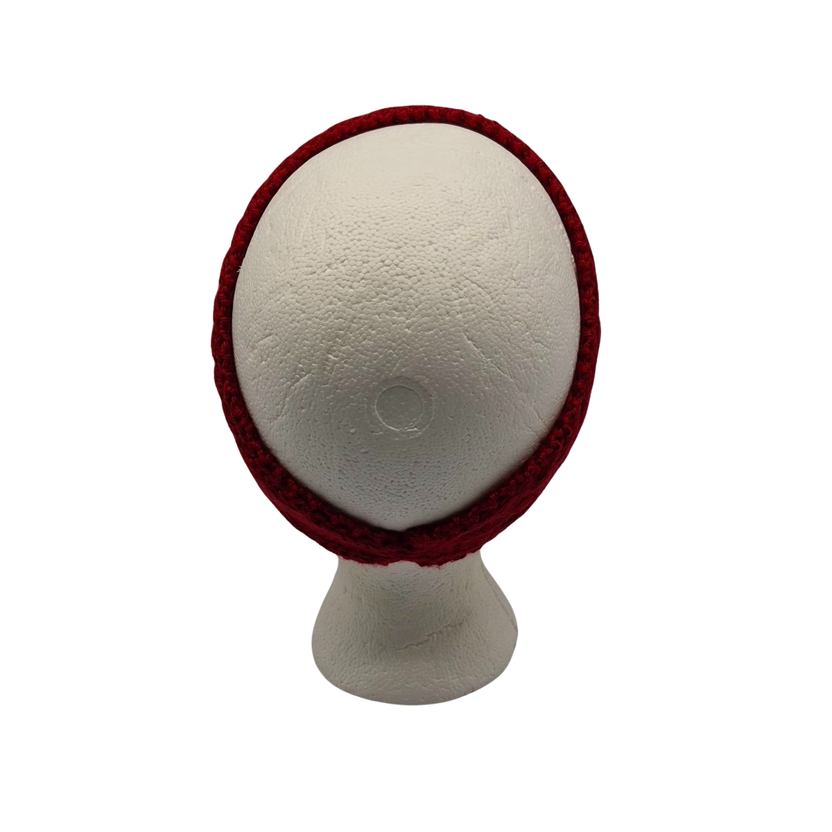 A deep red cable knit headband displayed on a white styrofoam mannequin head.