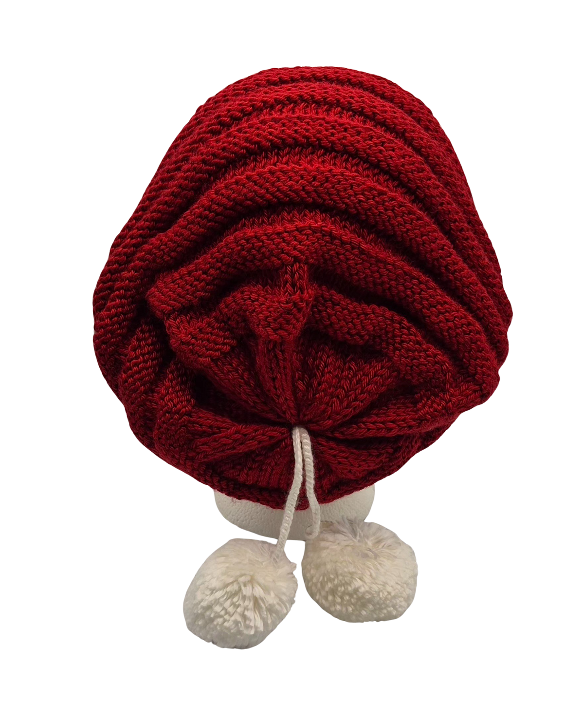 A red and white knit hat slouchy beanie with two pom-poms, displayed on a white mannequin head.