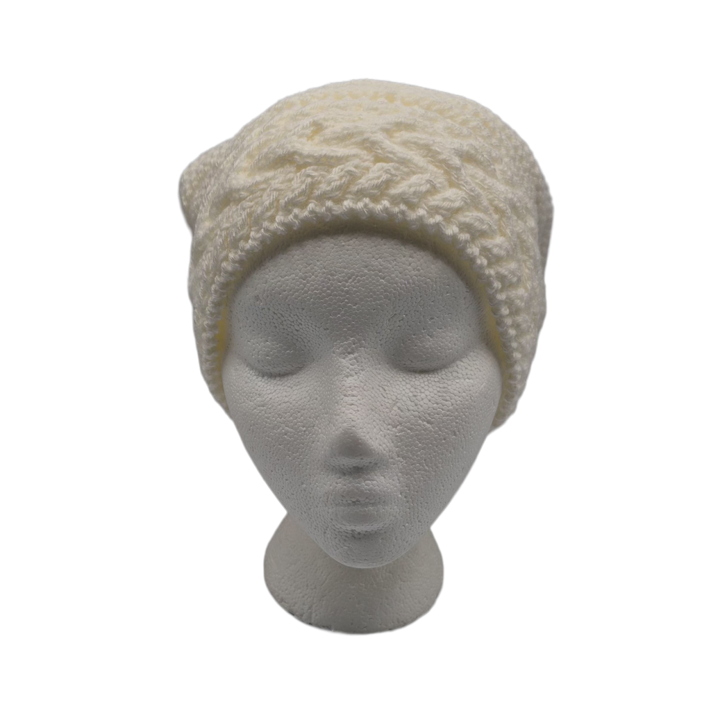 Cream white cable-knit beanie hat displayed on a white mannequin head.