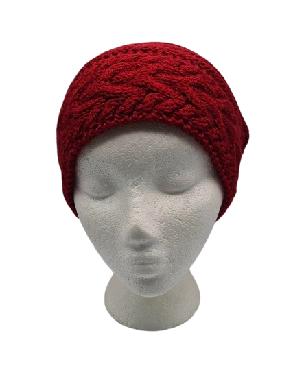 A dark red cable-knit slouchy beanie hat displayed on a white mannequin head.