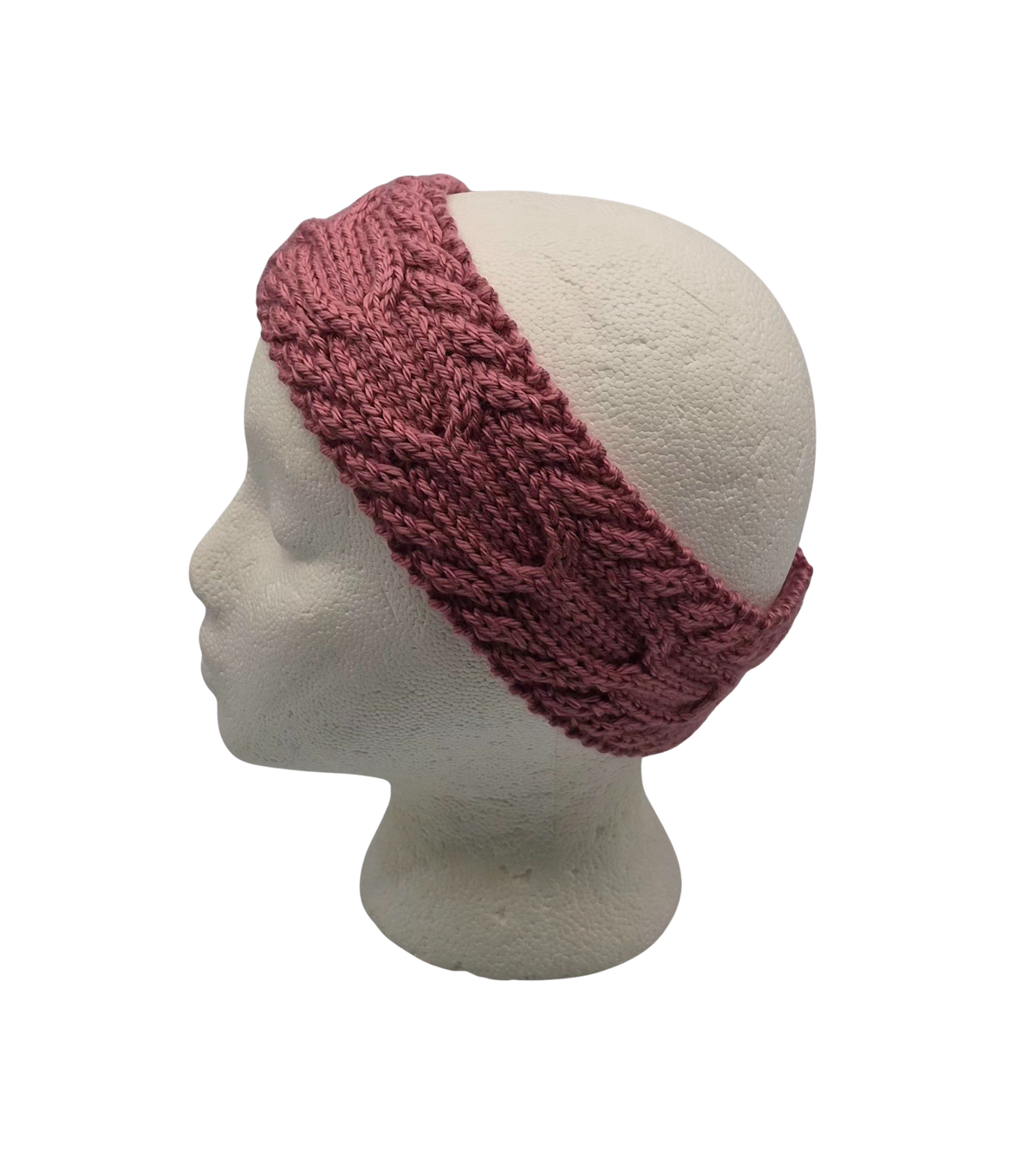 A dusty rose  cable-knit headband displayed on a white mannequin head.