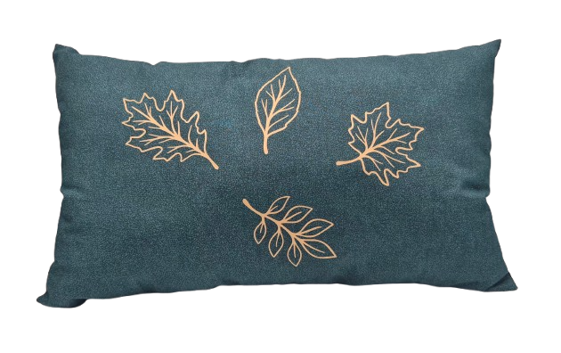 A rectangular green throw pillow featuring vinyl gold leaf designs.