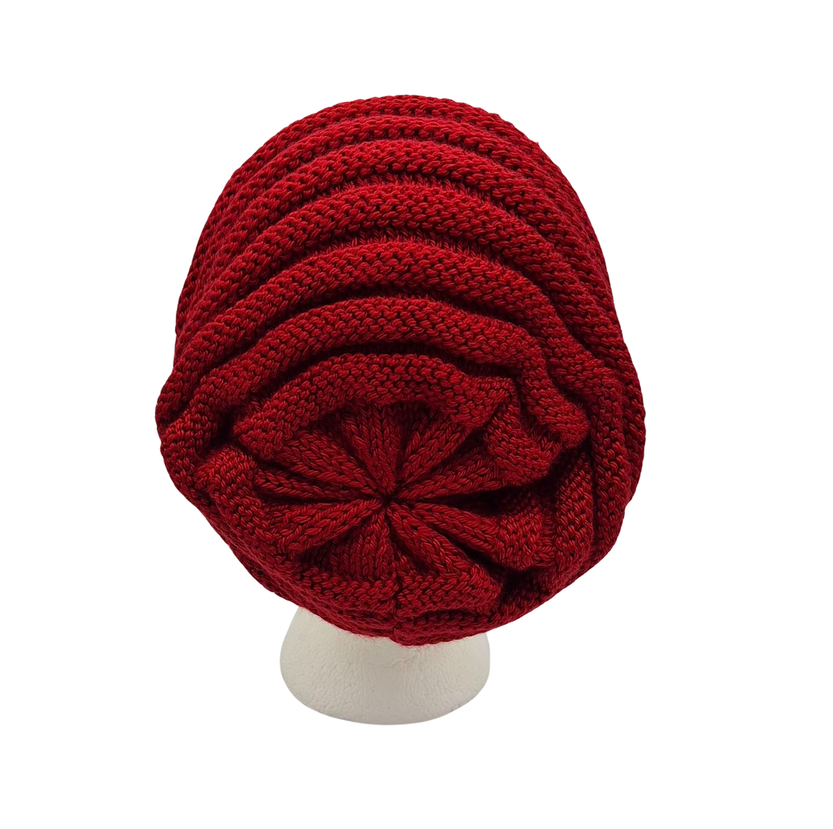 A red and white cable ribbed-knit slouchy beanie hat displayed on a white mannequin head.