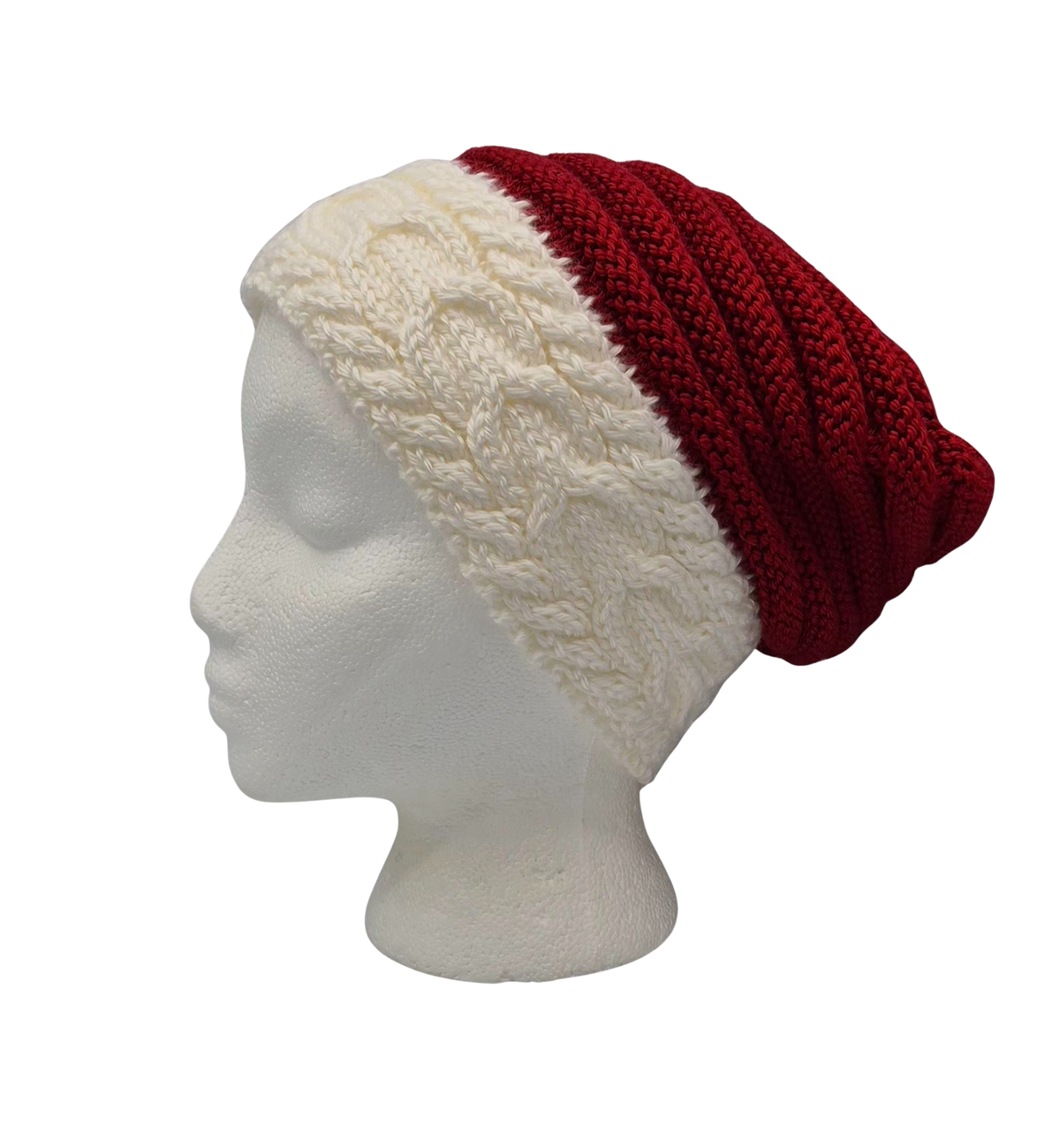 A red and white cable ribbed-knit slouchy beanie hat displayed on a white mannequin head.